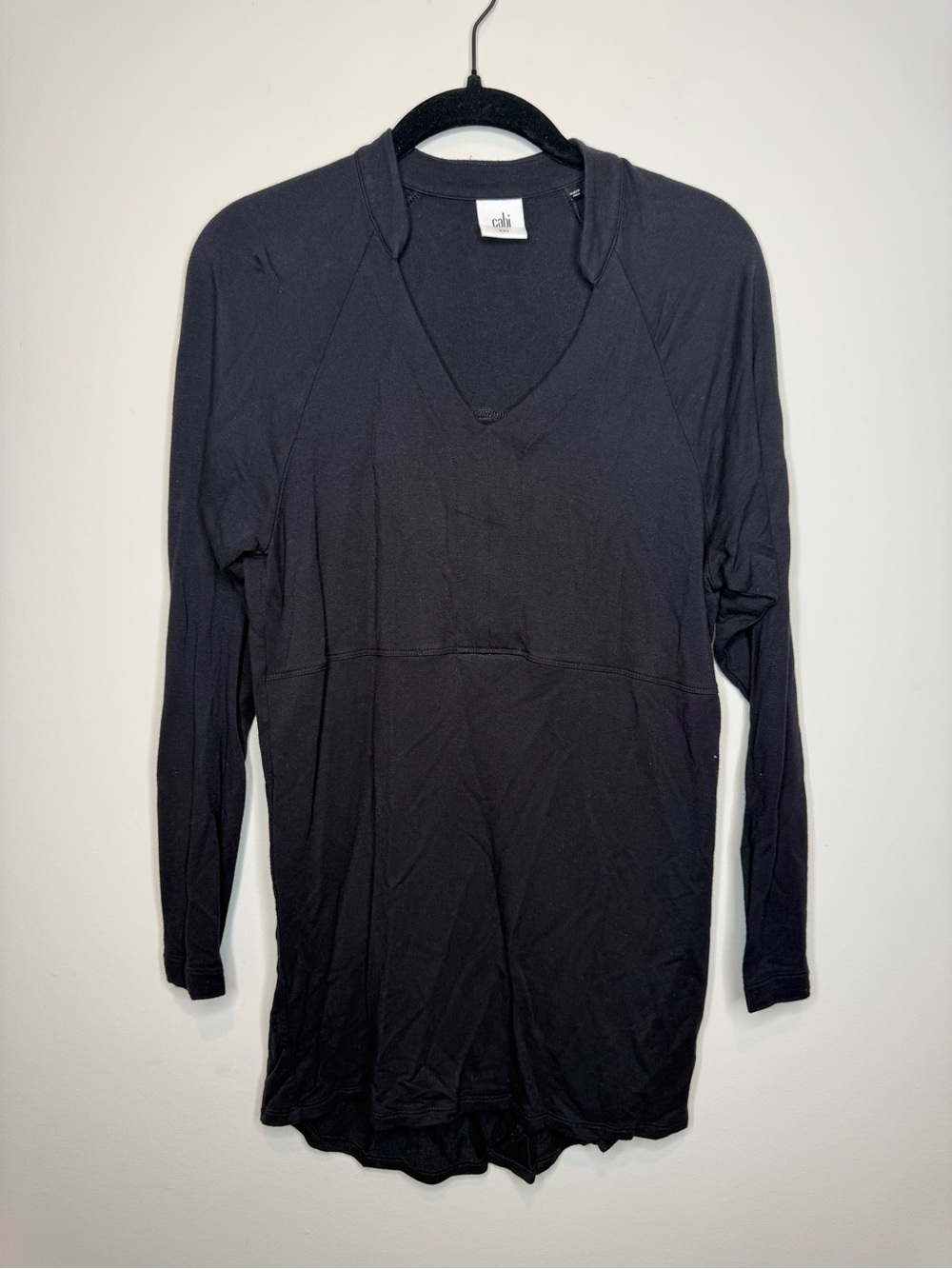 CAbi Gala tunic sweatshirt with a v-neck and long sleeves.